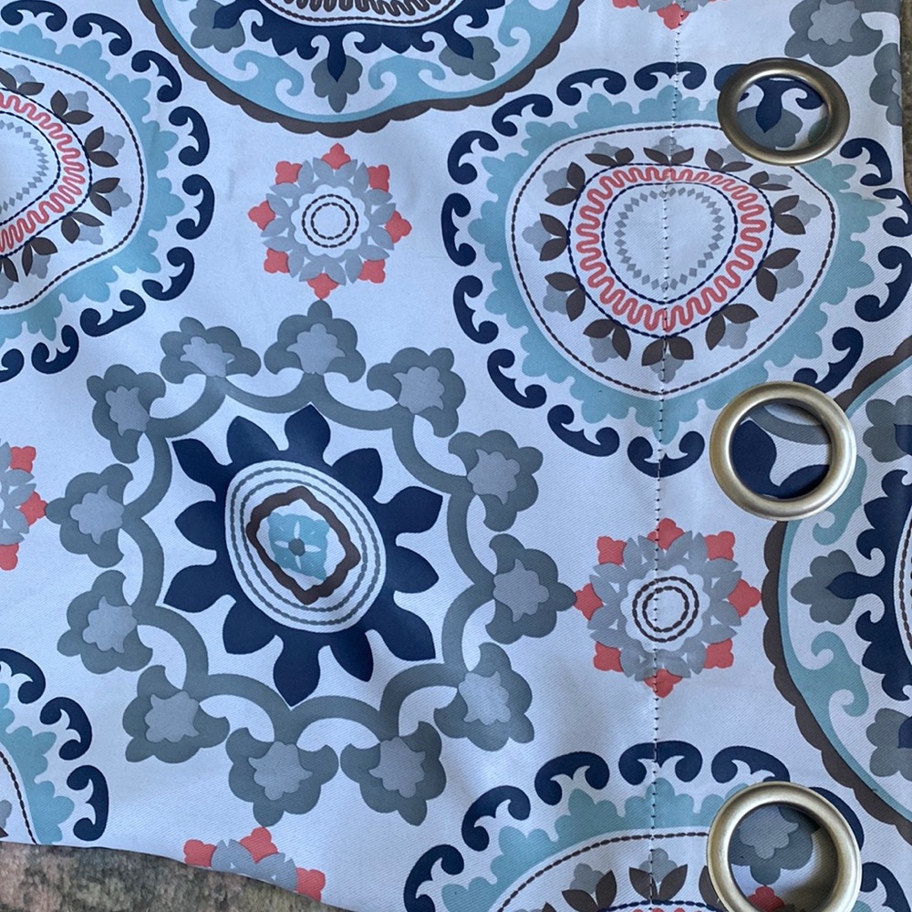 4 curtain or drape panels. Blue and white.